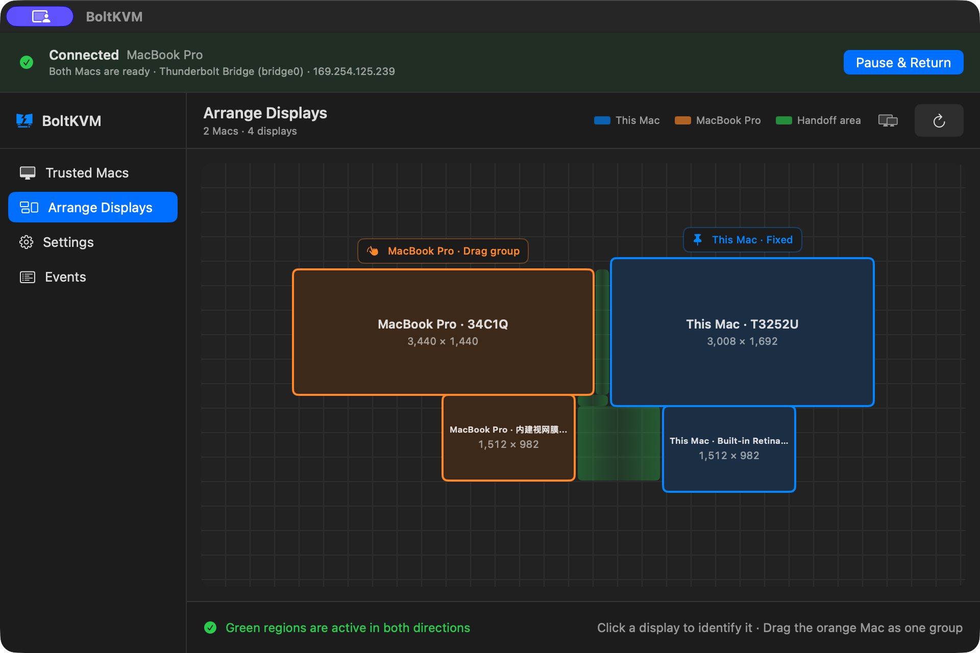 Real BoltKVM Build 200 UI arranging displays across two Macs